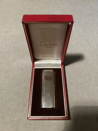Must cartier lighter - le,