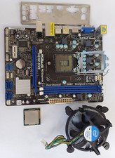 Asrock H61M-HVS + Intel Core i5-2400  Plus Heatsink/fan And I/0 shield.