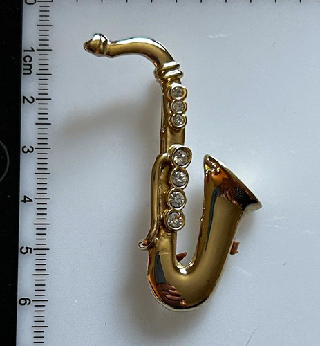 Gold tone saxophone - saxophone, brooch