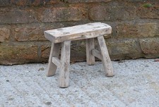 small vintage wooden milking