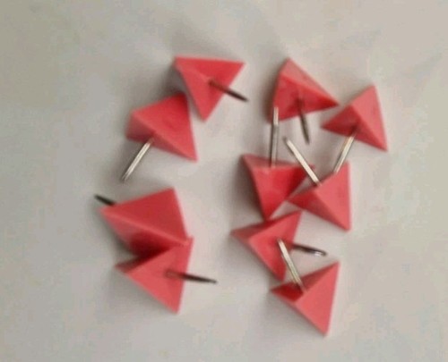 Pink triangle shaped push - 25, x
