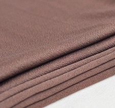 Brown cloth speaker grill - cloth,