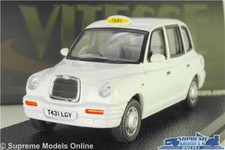 LONDON TAXI TX1 MODEL CAR MINICAB 1998 WHITE CAB 1:43 SCALE VITESSE K8