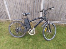 Wisper Works 905se Throttle assist Ebike with Stand and Panier Rack. 