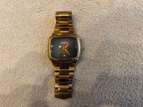 Nixon the player gold - player, black
