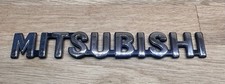 Genuine Mitsubishi Badge. Used Condition.