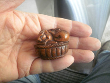 Hand Carved wood netsuke of 2