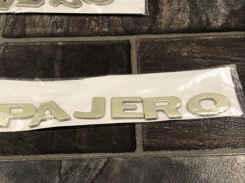 Mitsubishi pajero rear badge - rear,