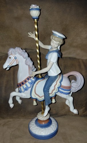 Lladro signed boy on - signed,
