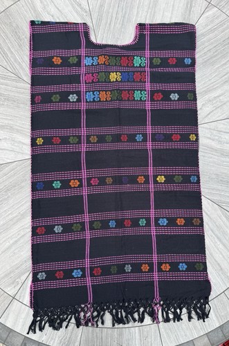 Hand woven amuzgo huipil knee - hand,