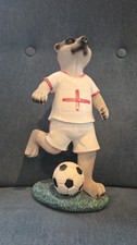 Garden Meerkat ornament Wearing England national football team's jersey.