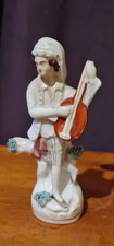 Antique Staffordshire figurine boy playing guitar