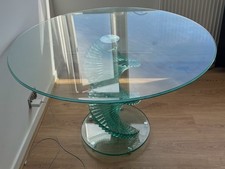 MODERN ROUND GLASS DINING TABLE WITH SCULPTURAL SPIRAL BASE