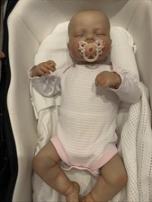Baby Doll with Clothes and Magnetic Pacifier Pre owned , looking for a new mum