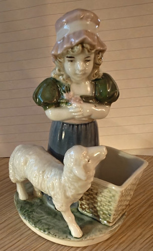 Shepherdess with sheep and