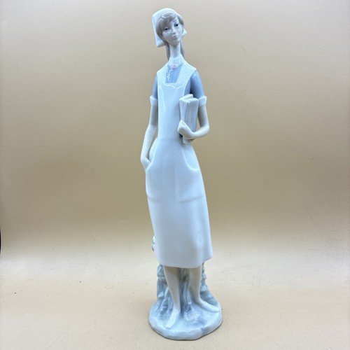 Lladro figurine nurse holding - lladro,