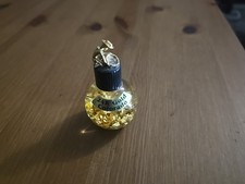  24 Karat Gold Flakes Floating in Oil Small Glass Bottle