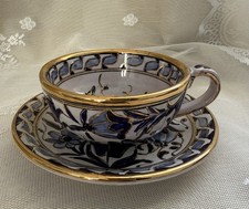 Hand-painted ceramic tea cup