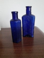Two Blue Glass Not To Be Taken  Vintage Poison Bottles