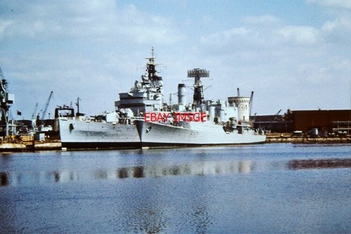 Photo hms tiger moored next - ,