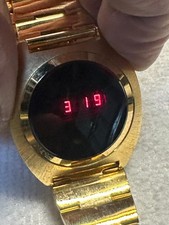 Vintage NITSUI Red LED Golden