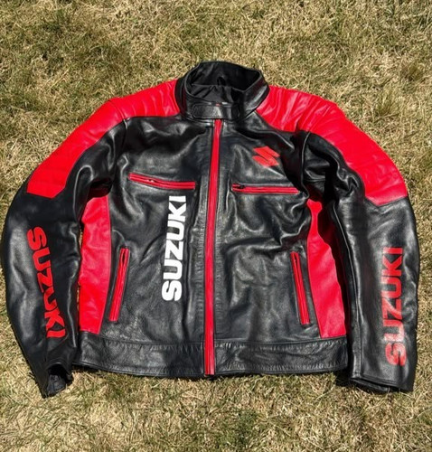 Suzuki red new motorbike - new,