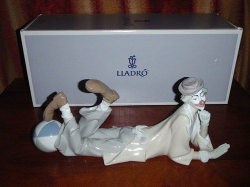 Lladro reclying clown with - clown,