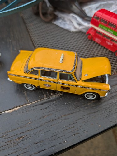 Yellow toy taxis checker taxi - taxis,
