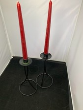 Tall black cast iron candle