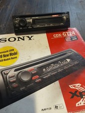 Boxed Sony car CD/Radio unit CDX-GT24 with mounting cage and instructions 