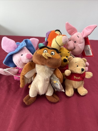Winnie the pooh plushies with - the,