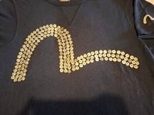 EVISU VINTAGE 17TH ANNIVERSARY T SHIRT WITH  METAL SEAGULL LOGO SIZE MEDIUM. 