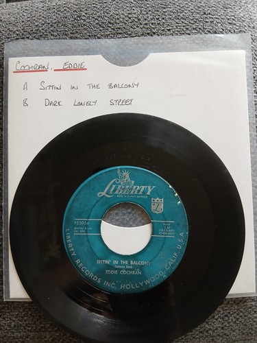 Eddie cochran sittin in the - -,