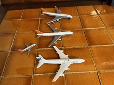 Four vintage metal planes