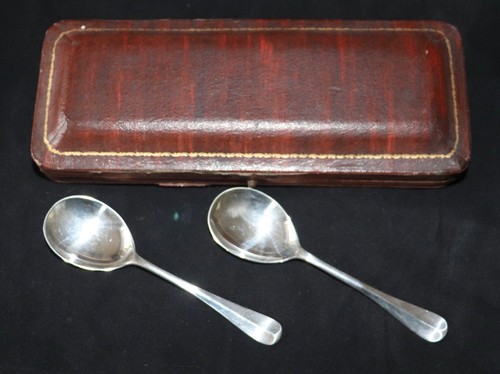 Pair sterling silver spoons - of,