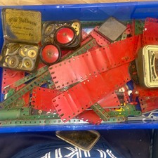 Vintage Meccano assorted parts including wheels, cogs