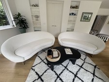 Two curved cream boucle three - curved,