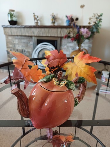Small cute teapot with - teapot, leaves