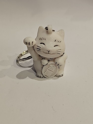 Maneki neko beckoning cat - beckoning,