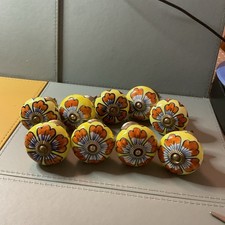 Nine Cupboard Draw Ceramic Knob Handles Yellow, Brown,  Blue. & White.