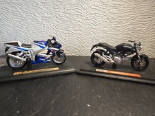1x Ducati 1x Suzuki  model motorbike 1.18th C