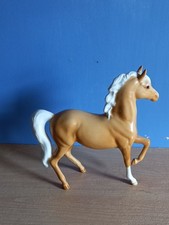 palomino prancing horse