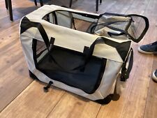 Portable medium pet carrier bag. Beige colour. Breathable mesh and padded handle