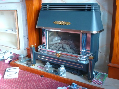 Gas fire back - &,