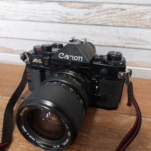 Canon film camera with lens - canon,