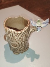 Wade Bird On Tree Stump - brown tree stump, blue bird