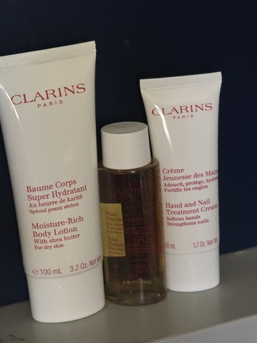 Clarins products with - clarins, bag