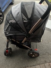 Grey Dog Stroller With Rose Gold Frame And Wheels