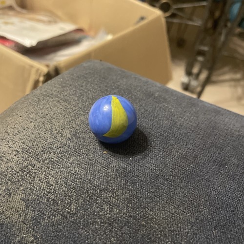 Large blue marble with green