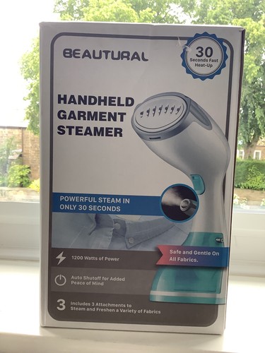 Handheld garment steamer - garment,